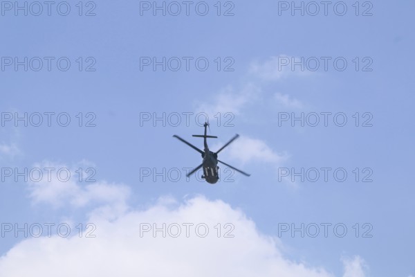 Turkish Air Force helicopters and fighter jets perform aerobatic maneuvers during Teknofest
