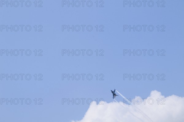 Turkish Air Force helicopters and fighter jets perform aerobatic maneuvers during Teknofest