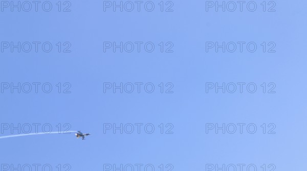 Turkish Air Force helicopters and fighter jets perform aerobatic maneuvers during Teknofest