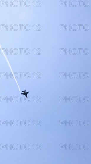 Turkish Air Force helicopters and fighter jets perform aerobatic maneuvers during Teknofest