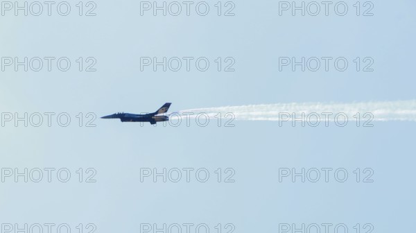 Turkish Air Force helicopters and fighter jets perform aerobatic maneuvers during Teknofest