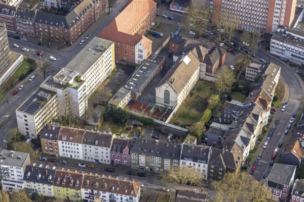 Aerial view, Munckelstraße, former Gelsenkirchen prison and sports field with weathered roofing,