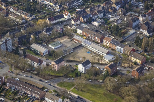 Aerial view, Maltese school with schoolyard, residential area apartment blocks, Neustadt,