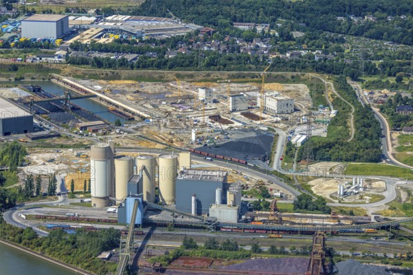 Aerial view, construction site with new construction of electrical switching houses for direct