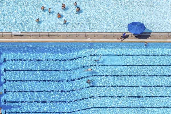 Aerial view, outdoor swimming pool Homberg with swimming pool and bathers, lifeguard with parasol
