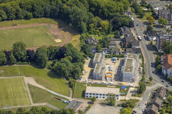 Aerial view, construction site on a former sports facility, residential area new construction and