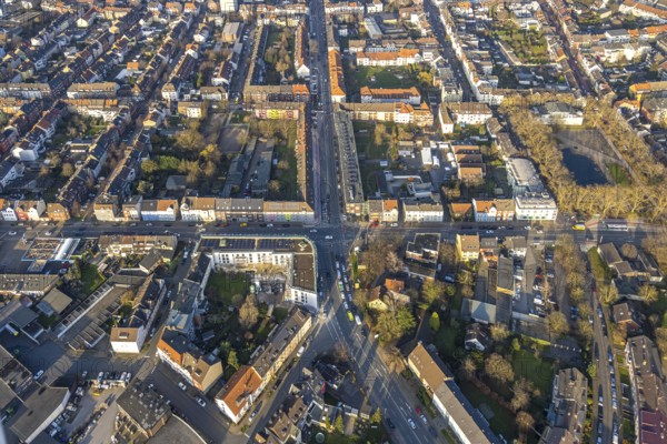 Aerial view, residential area and construction site with new residential building on the corner of