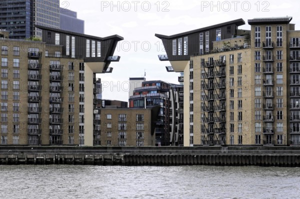 London, England, Great Britain, Europe, Modern residential buildings with unique roof shapes on the