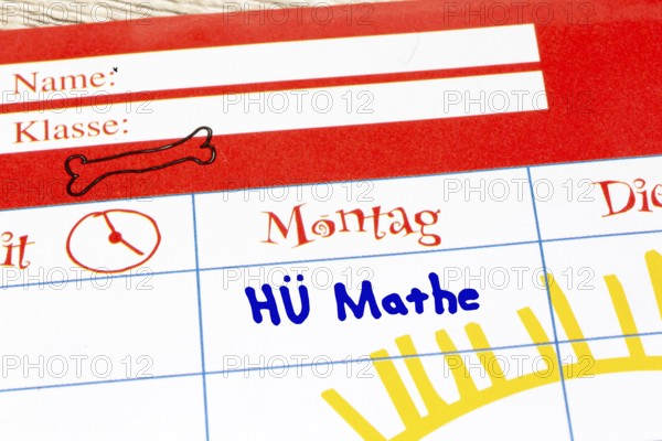 (Photomontage) Close-up of a timetable with added text HÜ MATHE
