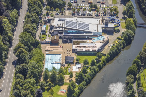 Aerial view, Olpe leisure pool, outdoor and indoor swimming pool with sun loungers and water slide,