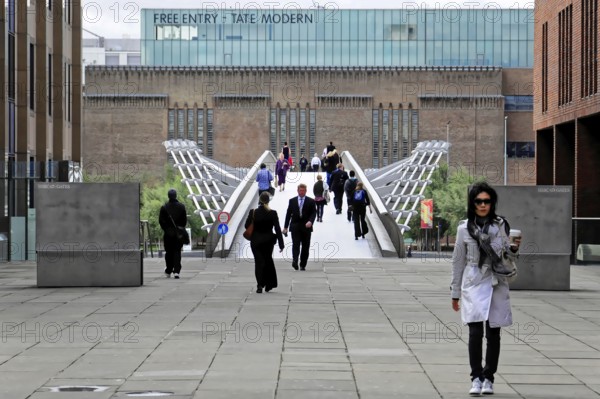 Millenium Bridge, behind TATE MODERN, London, England, Great Britain, Europe, Cityscape with people
