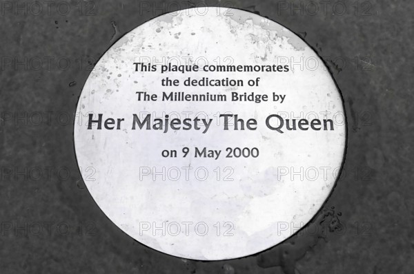 Plaque commemorating the inauguration of the Millennium Bridge by the Queen on 9 May 2000, London,