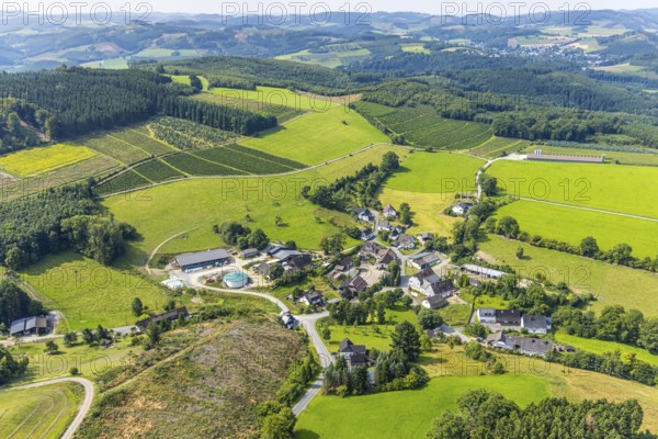 Aerial view, residential area local view district Büemke with chapel St. Agatha, meadows and fields