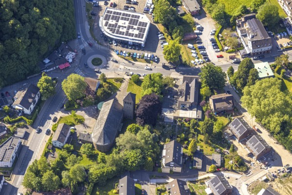 Aerial view, residential area at St Joseph's Church, Ford Kneifel car dealership with solar roof,