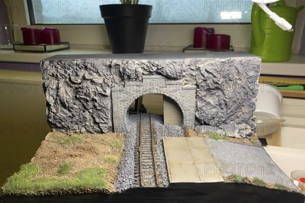 Model making diorama: railway tunnel with tracks and rocky landscape, Haan, North Rhine-Westphalia,