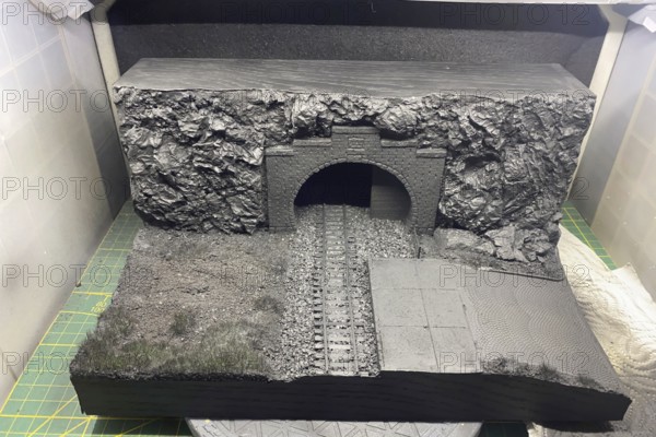 Modelling diorama: tunnel portal, tracks and rocky landscape in the shell, Haan, North