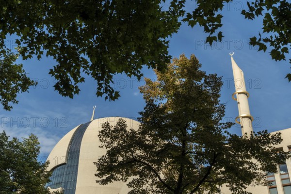 Mosque Cologne with minaret and trees