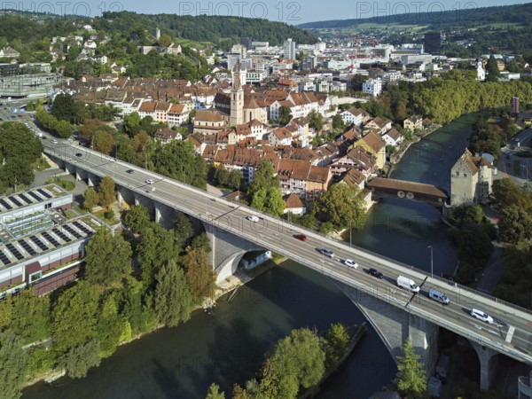 View of the old town, in front the high bridge, behind the covered wooden bridge with the