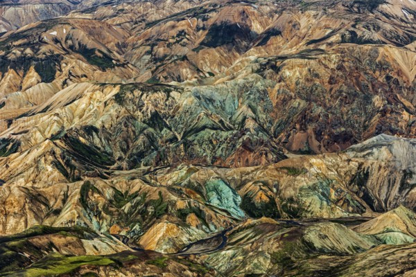 Mountain landscape, snowfields, sunny, summer, volcanic landscape, aerial view, ryolite rock
