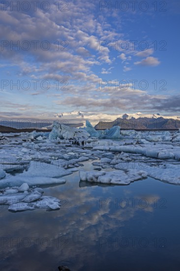 Icebergs, ice floes, lake, glacier lagoon, glacier, mountains, clouds, summer, morning mood,