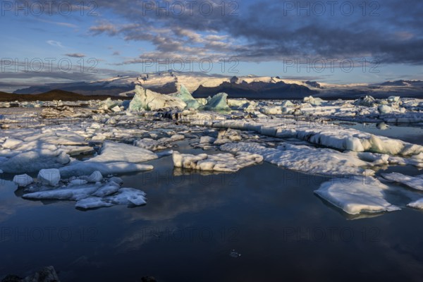 Icebergs, ice floes, lake, glacier lagoon, glacier, mountains, clouds, summer, morning mood,
