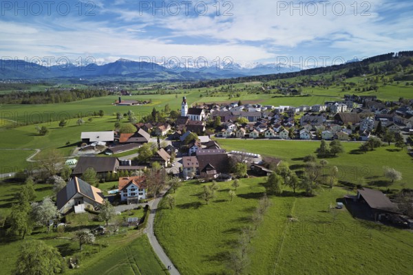 View of the village, behind the Rigi and the snow-covered Alps, Beinwil, Freiamt, Canton, Aargau,