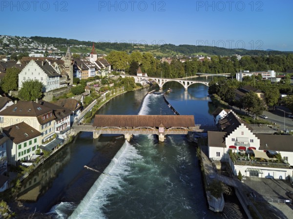 Old town with the tower of the Muri- Amthof, in the foreground the weir and the old wooden bridge