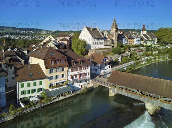Old town with the tower of the Muri- Amthof, in the foreground the weir and the old wooden bridge