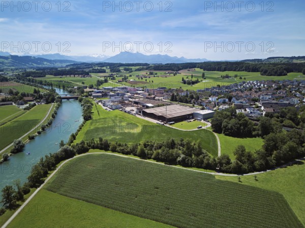 View of the village, industrial area on the right, Pilatus in the background, Sins, Freiamt, Canton