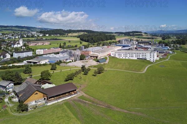 Industrial area and the village with the catholic parish church Mariä Geburt, Sins, Freiamt,