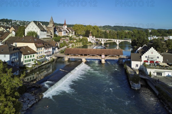 Old town with the tower of the Muri- Amthof, in the foreground the weir and the old wooden bridge