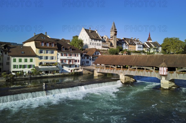 Old town with the tower of the Muri- Amthof, in the foreground the weir and the old wooden bridge
