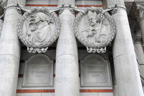 London, England, Great Britain, Europe, Two stone reliefs of historical figures on a Gothic