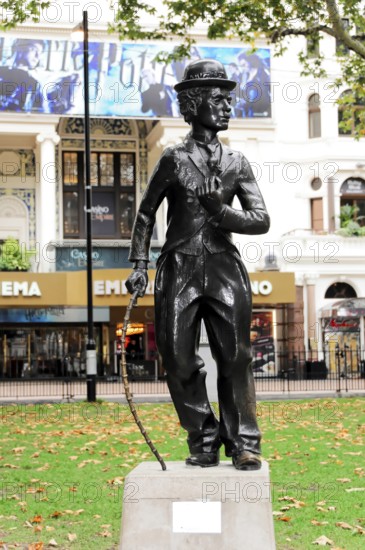 London, England, Great Britain, Europe, Bronze statue of Charlie Chaplin in front of a cinema in a