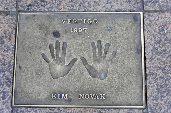 Memorial plaque with handprints and inscription for Kim Novak from 1997, London, England, Great