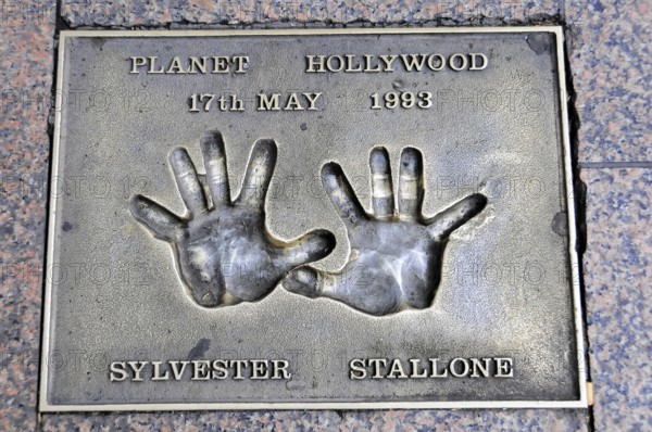 Sylvester Stallone's handprints for Planet Hollywood on a metal plate, London, England, Great