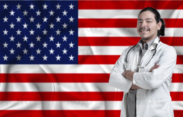 United States Health and Care concept. Male doctor on United States flag. Doctor with crossed arms