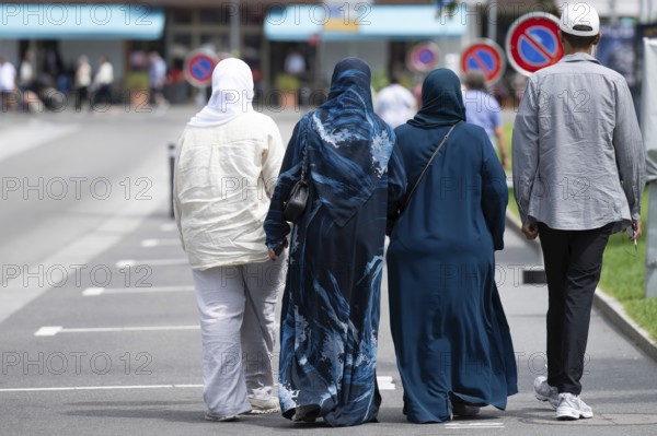 Women with headscarves, Interlaken, Switzerland