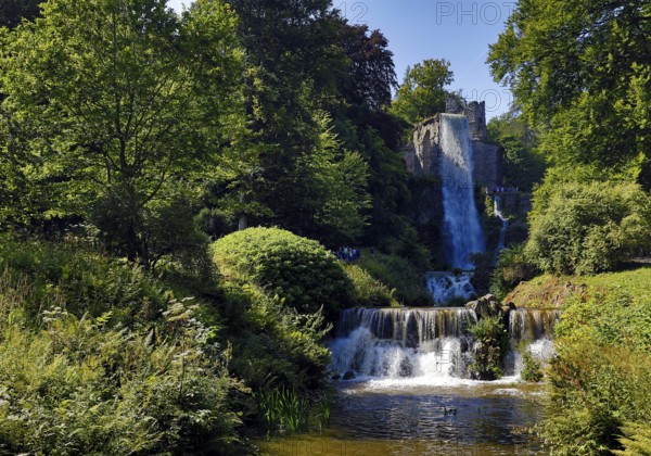Water features at the equaduct with the highest artificial waterfall in a landscaped garden,