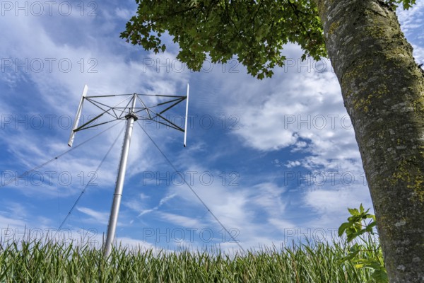 Vertical axis wind turbine, Darrieu wind turbine, 2 vertically mounted rotors rotate around the