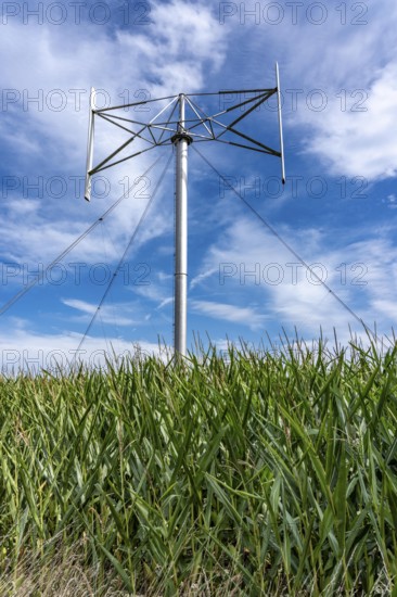 Vertical axis wind turbine, Darrieu wind turbine, 2 vertically mounted rotors rotate around the