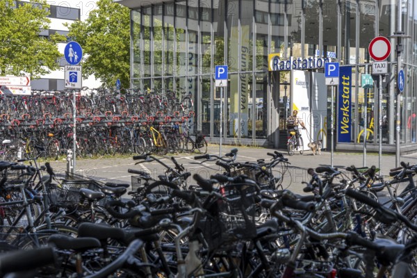 Cycling in Münster, large bicycle parking area in front of Münster main station, bicycle station,
