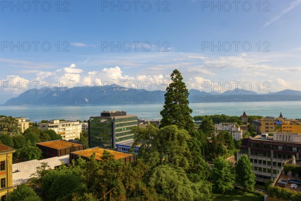 Cityscape and Lake Geneva with Mountain View in a Sunny Summer Day in Lausanne, Vaud, Switzerland