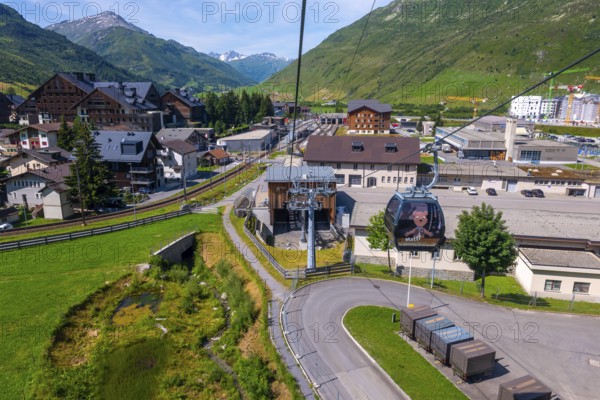 Beautiful View From Overhead Cable Car and Station and over Cityscape and Railroad Station with