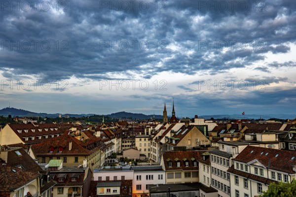 Panoramic Beautiful Cityscape and Cathedral Tower in Sunset with Cloudscape in City of Bern, Canton