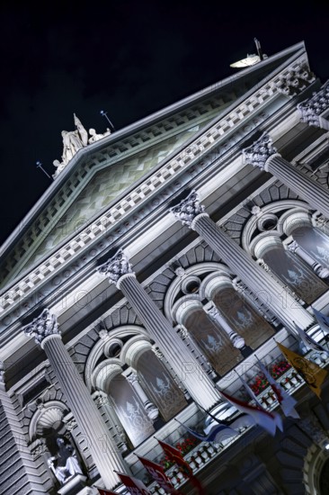 Beautiful Bundeshaus Illuminated Parliament Building or Federal Palace with Statue at Night in City