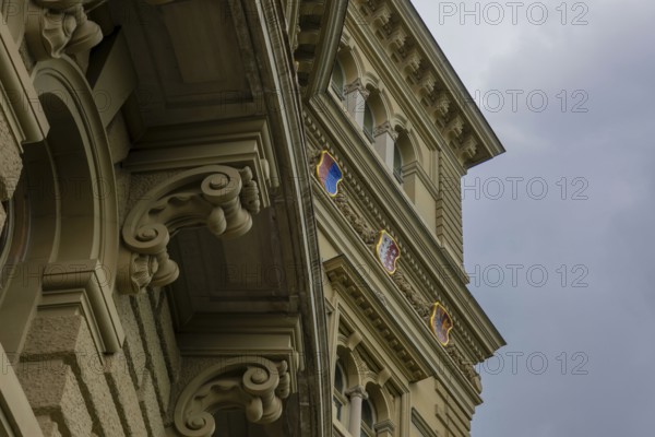Beautiful Bundeshaus Parliament Building or Federal Palace with Canton Shield and Storm Clouds in