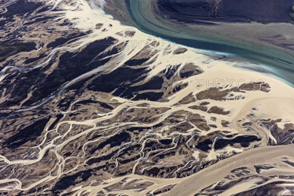 Mountain landscape, river, river delta, river course, volcanic landscape, sunny, aerial view,