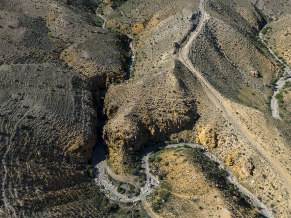 View of hilly landscape with clearly visible unpaved roads, aerial view, Angel's Canyon, canyon,