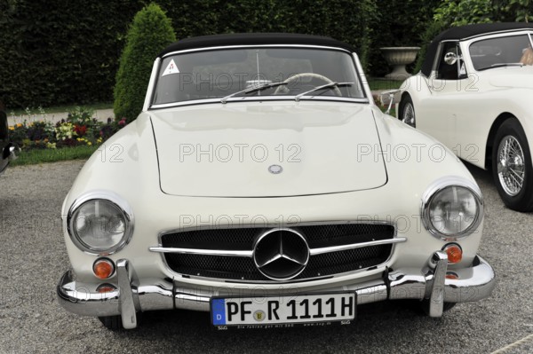 Mercedes-Benz 190 SL cabriolet, Vintage car, Classic white Mercedes convertible vintage car in an